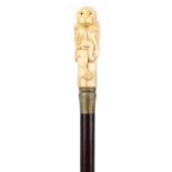 Hardwood walking stick with carved bone and inlaid abalone handle in the form of two monkeys, 90cm