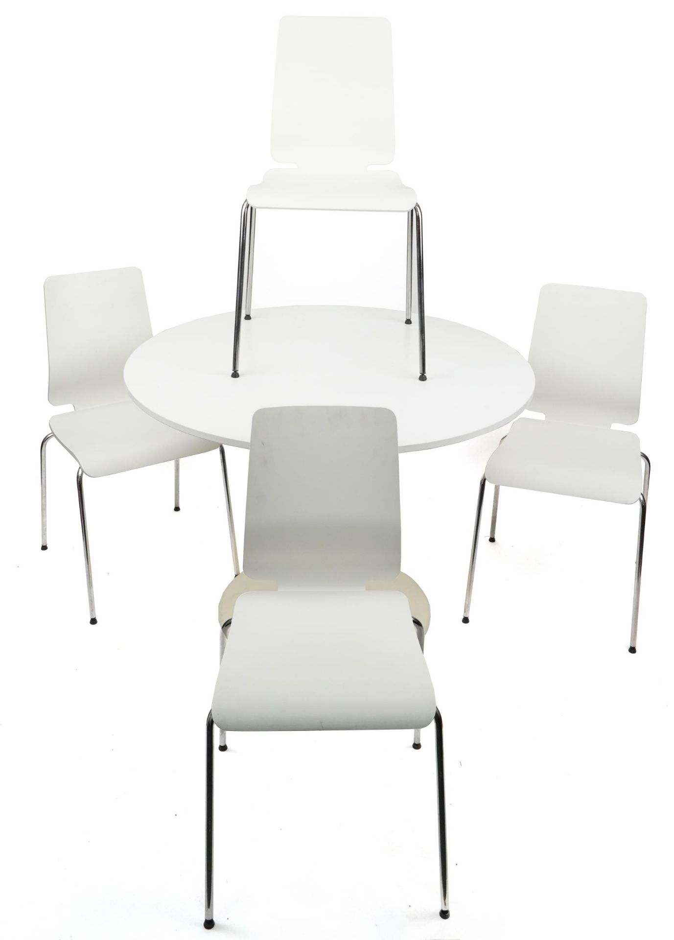 Contemporary circular tulip dining table with four chairs, the table 75cm high x 105cm in diameter :