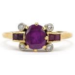 Unmarked gold ruby and diamond cluster ring, tests as 18ct gold, the largest ruby approximately 6.