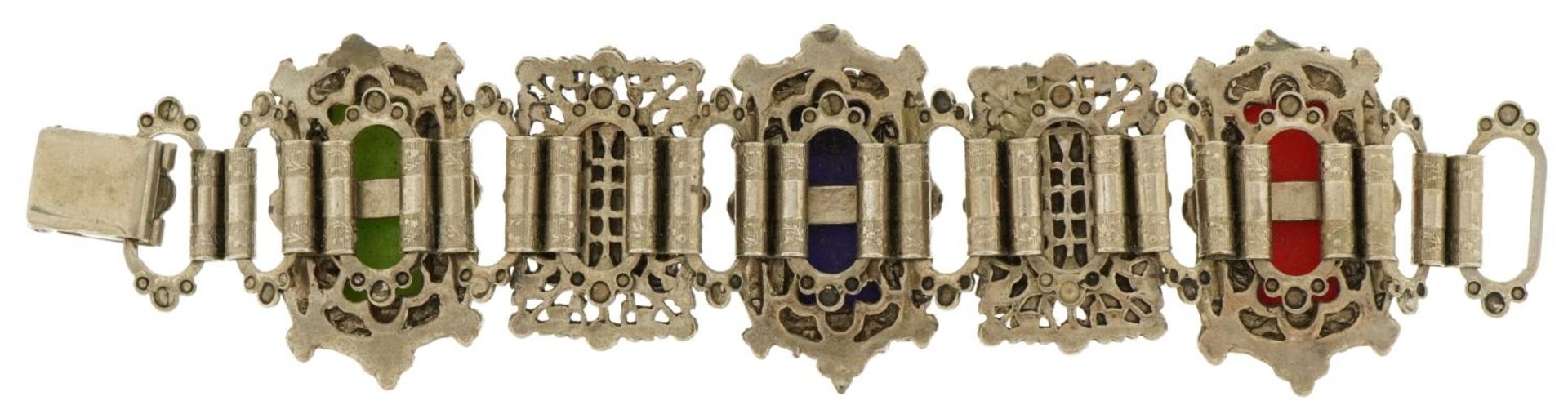 Thai white metal panelled bracelet with carved busts, 18cm in length, 77.0g : For further - Image 3 of 3