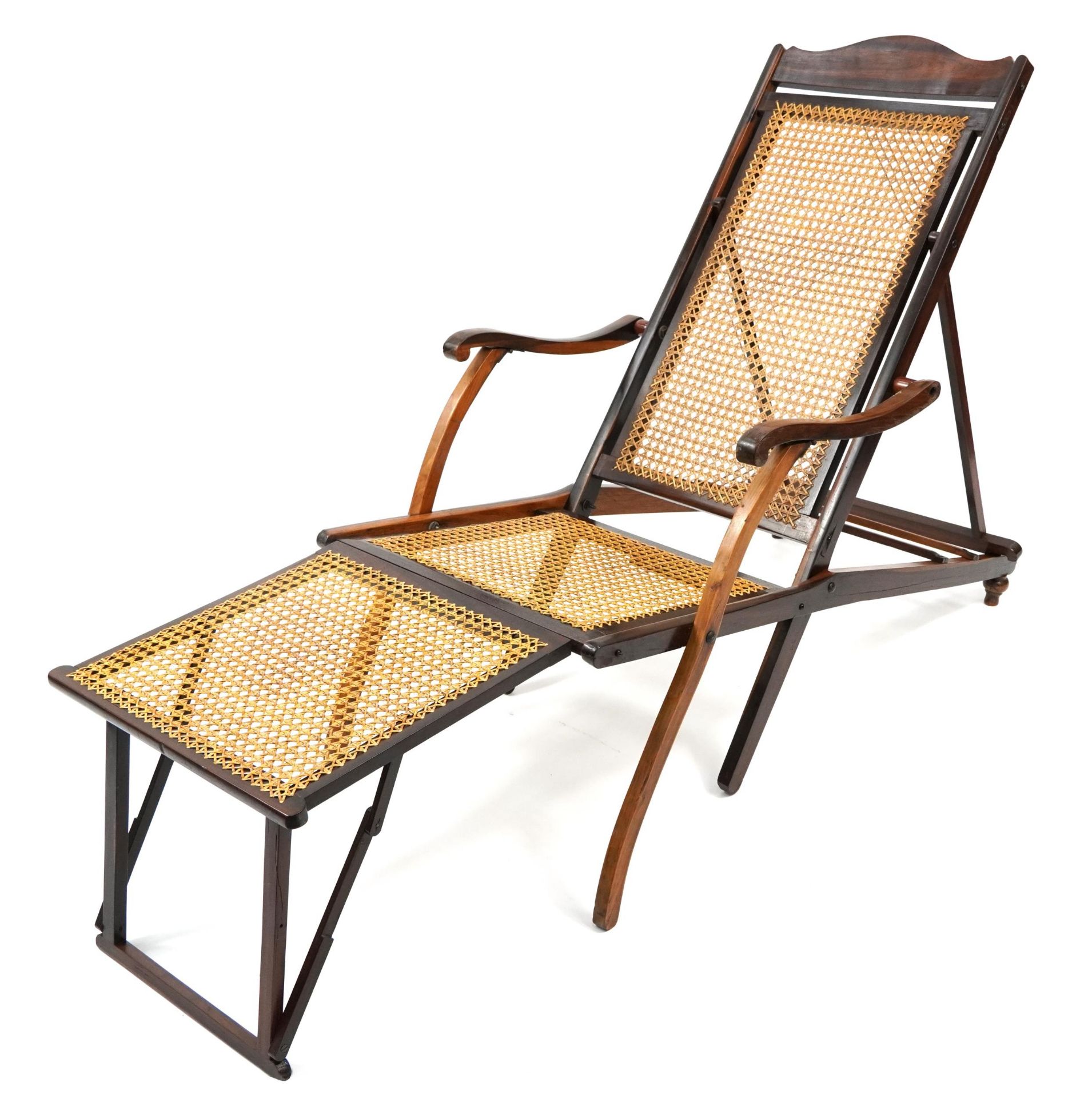 Early 20th century rosewood and bergere folding campaign steamer chair, 152cm in length : For