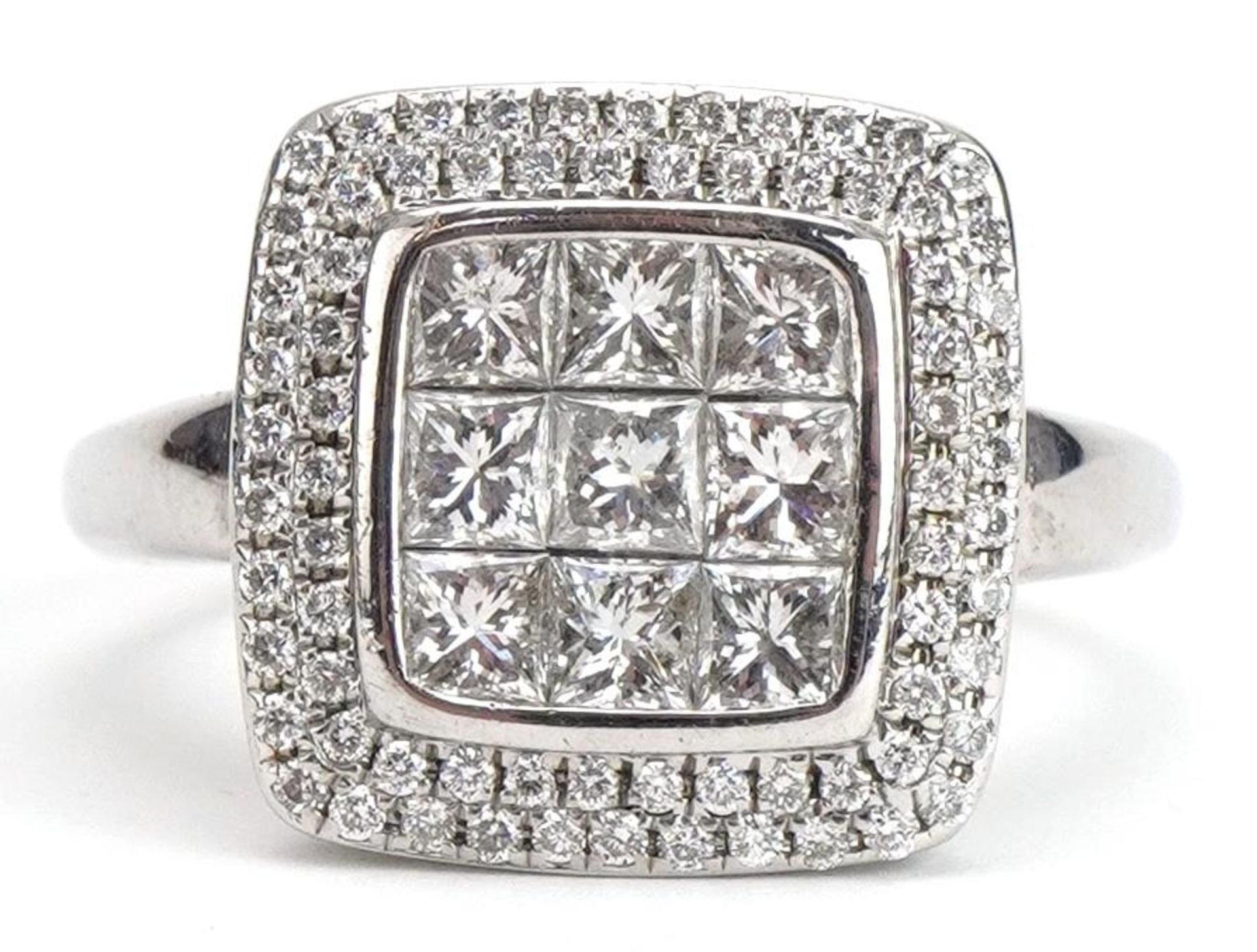 18ct white gold diamond cluster ring, the band stamped 1.50 carat, size P, 5.5g : For further