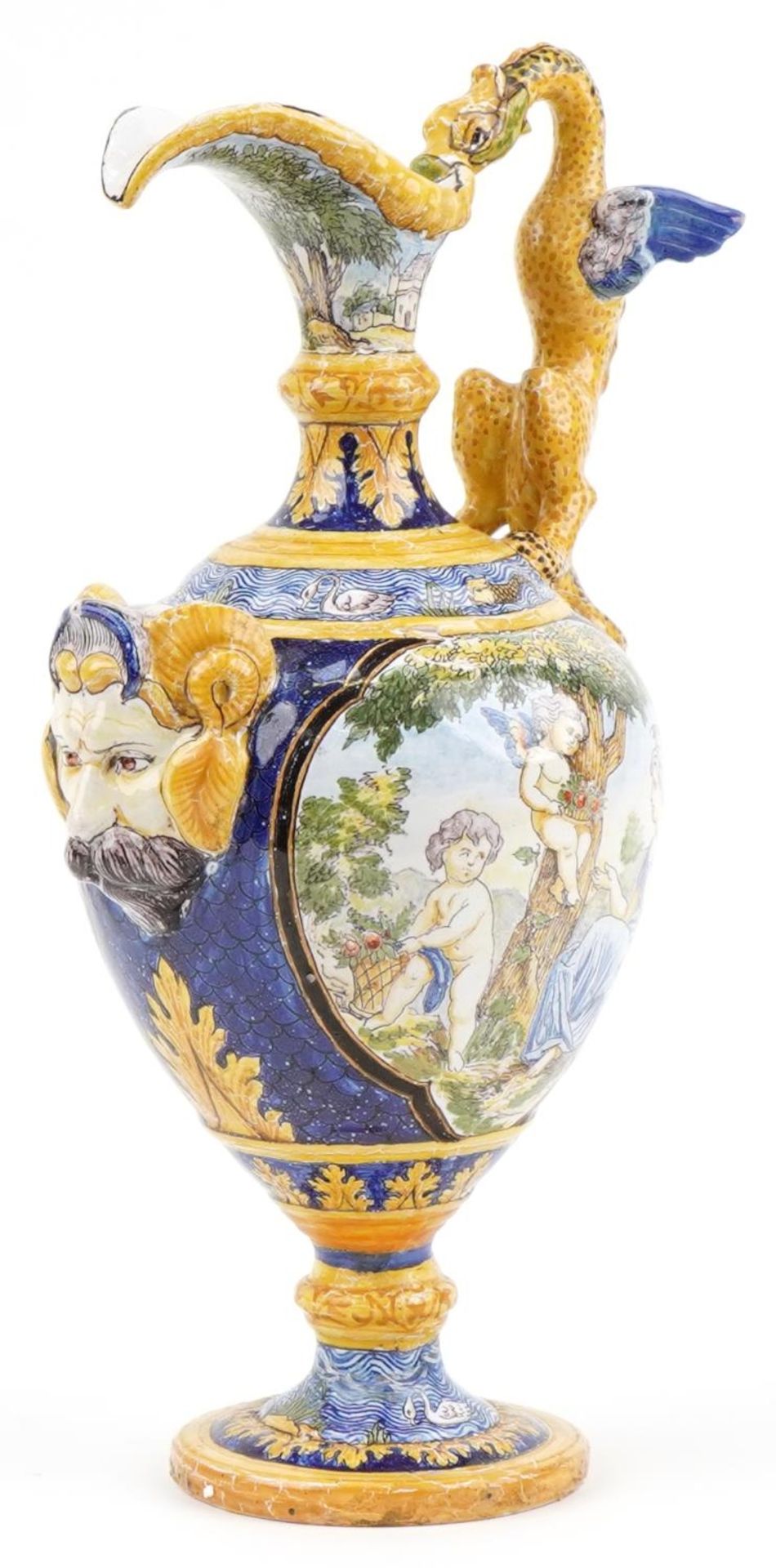 Attributed to Cantagalli, Italian Maiolica ewer with mythical handle and mask, hand painted with