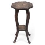 Manner of Liberty & Co, Japanese hardwood side table carved with flowers, 76cm high x 43cm in