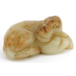 Chinese russet and pale green jade carving of a mythical animal, 8cm wide : For further