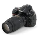 Nikon D700 DSLR camera body with Nikon DX55-300mm lens : For further information on this lot