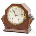 Art Deco walnut and rosewood fan design mantle clock striking on a gong having silvered dial with