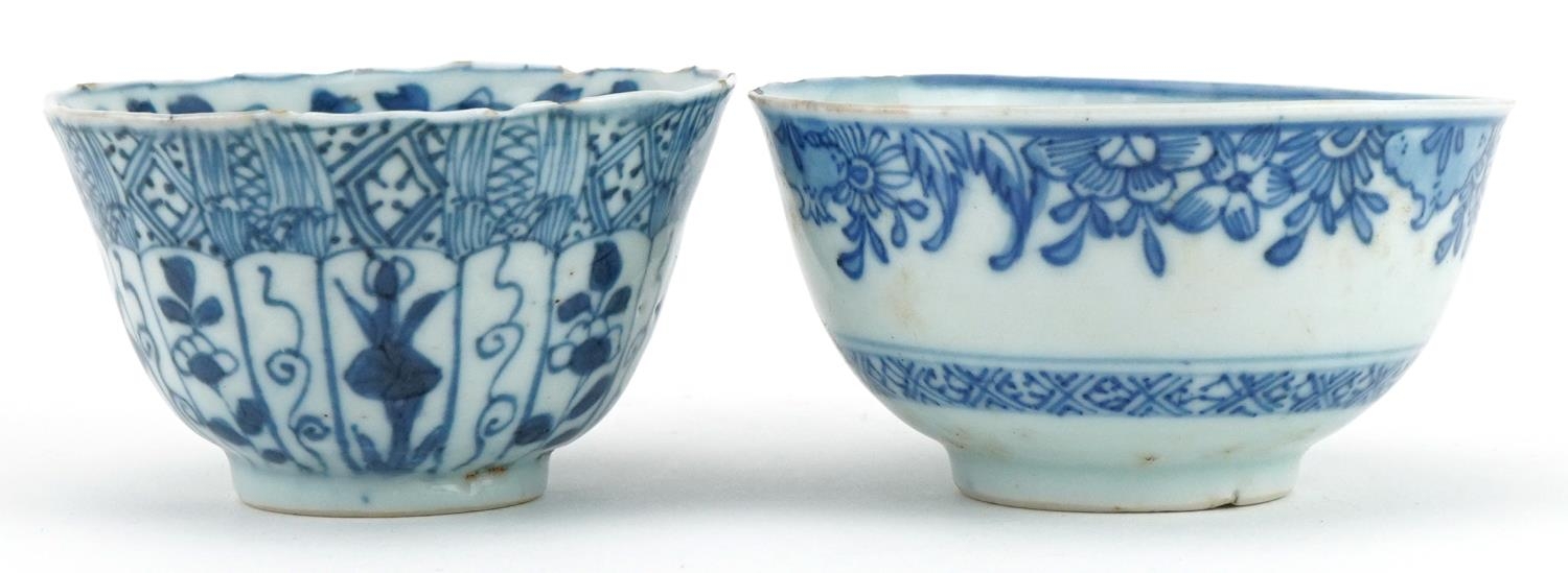 Two Chinese blue and white porcelain tea bowls including one hand painted with panels of flowers and