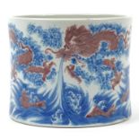 Chinese blue and white with iron red porcelain brush washer hand painted with a dragon chasing