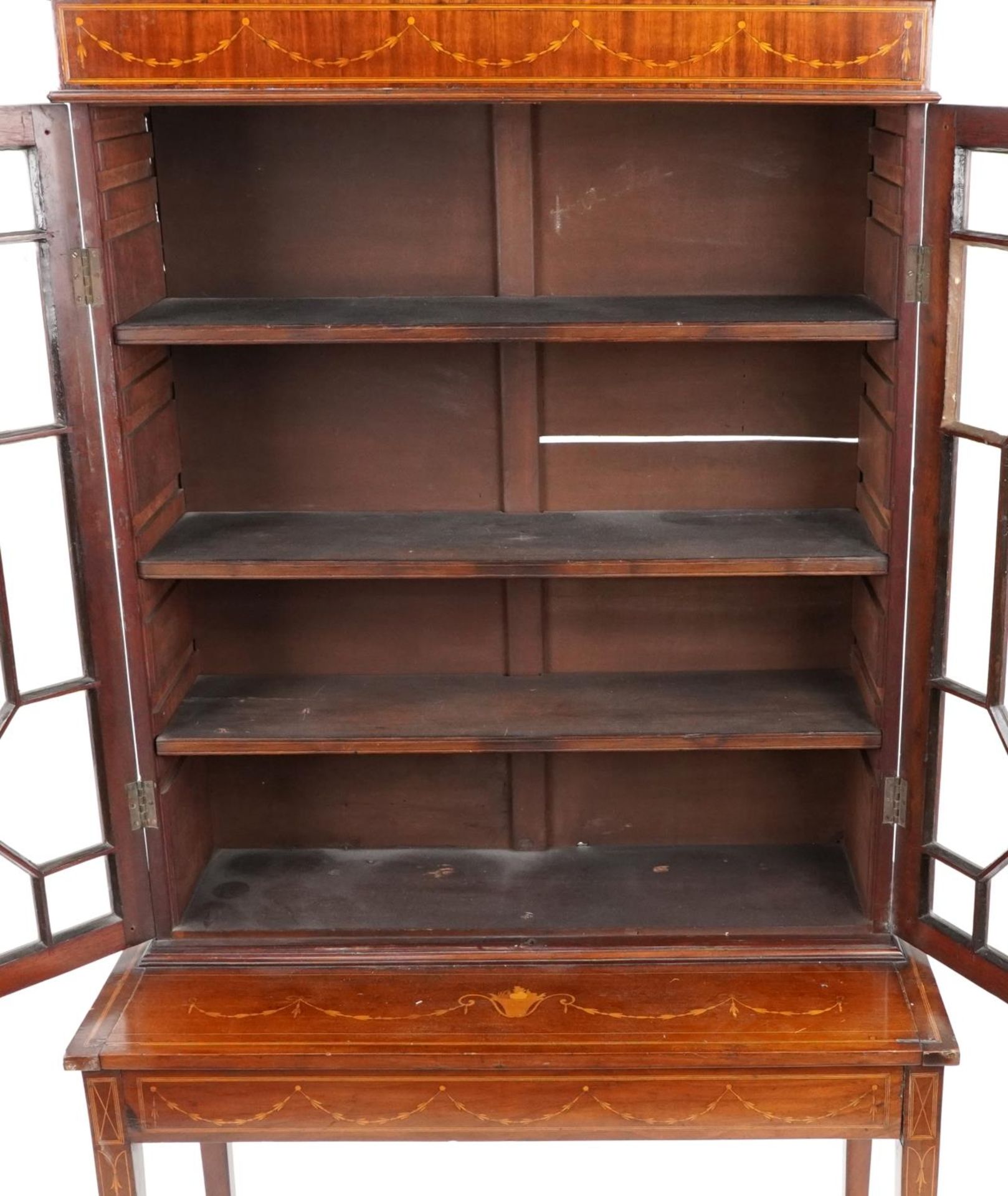 Edwardian inlaid mahogany bookcase on stand with astragal glazed doors on tapering legs, 189cm H x - Image 4 of 6