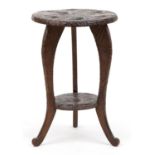 Manner of Liberty & Co, Japanese hardwood side table carved with flowers, 61cm high x 41cm in