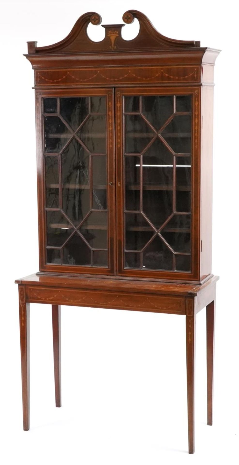 Edwardian inlaid mahogany bookcase on stand with astragal glazed doors on tapering legs, 189cm H x