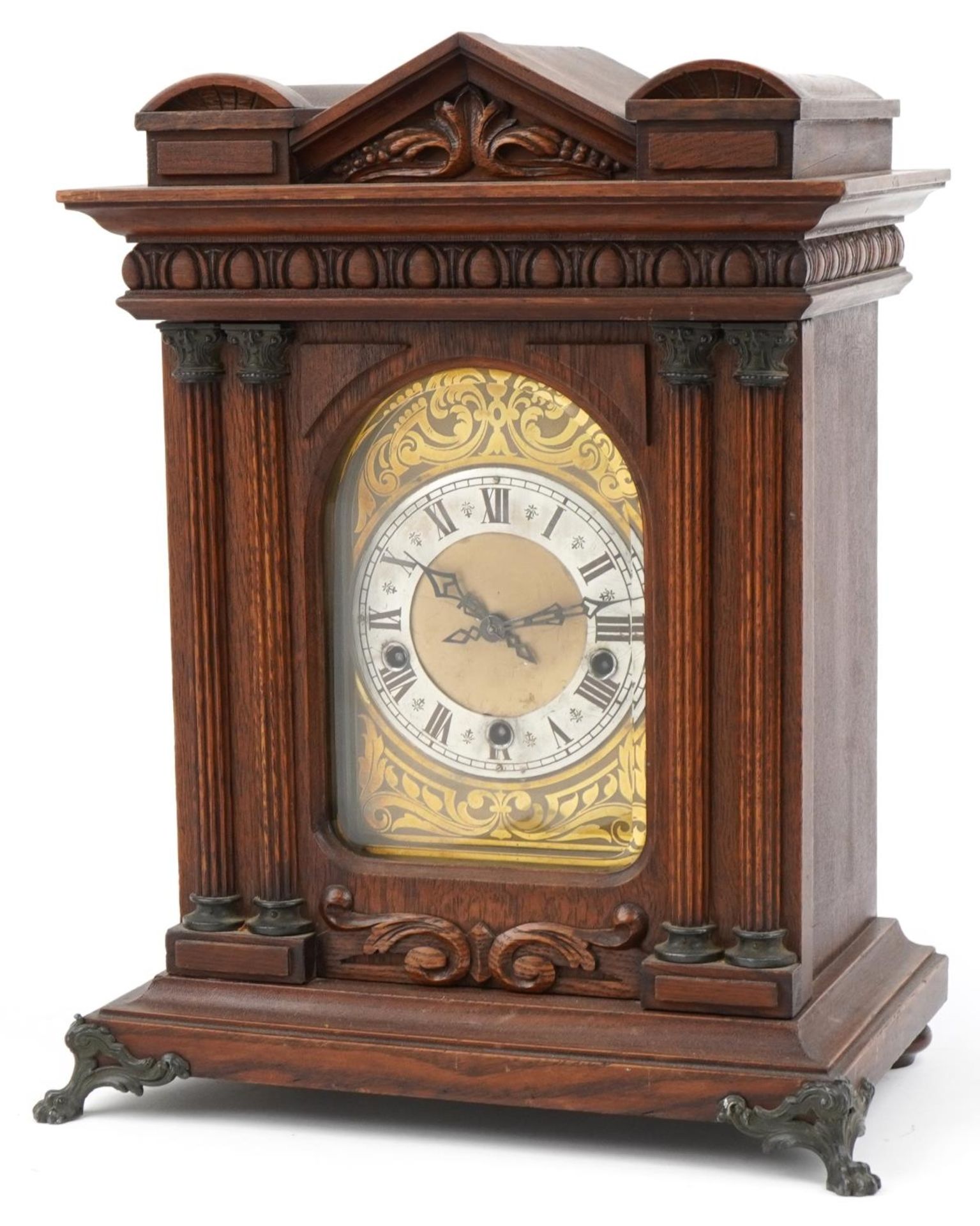 19th century oak bracket clock striking on five rods with Westminster chime, with Corinthian