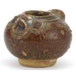Chinese stoneware jar in the form of a bird having a brown glaze, 8cm in length : For further
