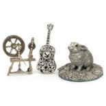 Silver objects comprising a sterling silver filled rabbit, doll's house guitar and spinning wheel