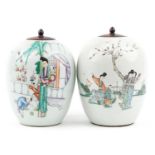 Pair of Chinese porcelain jars with hardwood lids hand painted in the famille rose palette with
