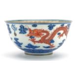 Chinese blue and white with iron red porcelain bowl hand painted with two dragons chasing the