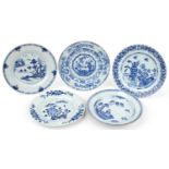 Four Chinese blue and white porcelain plates and a soup bowl hand painted with a fisherman in a