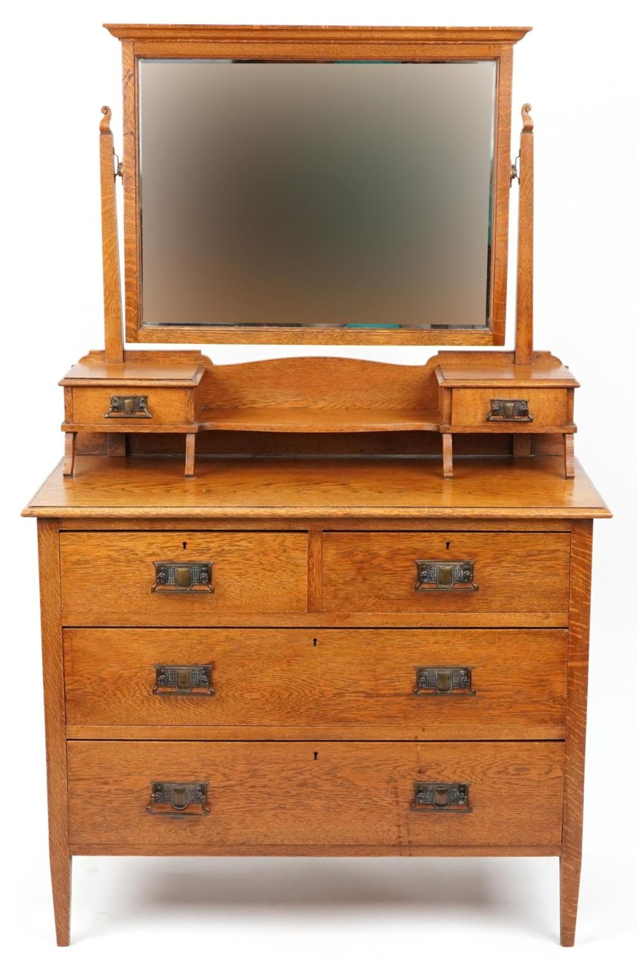 Arts & Crafts oak dressing chest with swing mirror and ornate bronzed handles, 147.5cm H x 91cm W