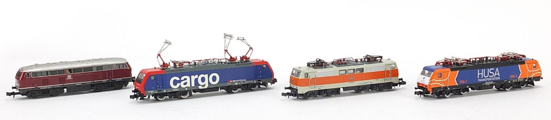Four Trix and Minitrix N gauge model railway locomotives : For further information on this lot