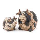 Athezza, graduated pair of mid century style pottery cows, the largest 21cm high : For further