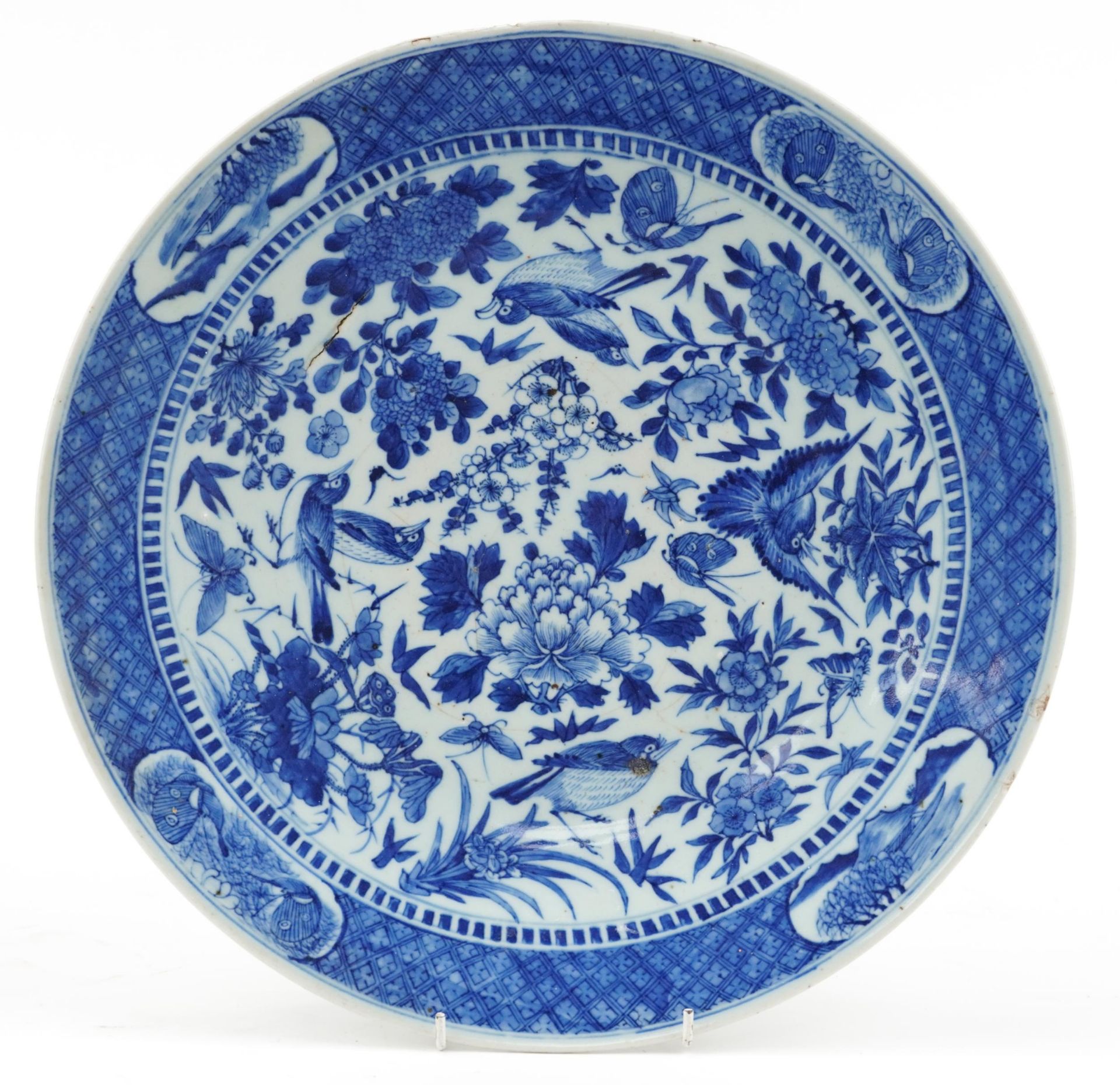 Chinese blue and white porcelain charger hand painted with birds and butterflies amongst flowers,