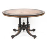 Victorian aesthetic burr walnut and ebonised tilt top table carved with flowers amongst scrolling