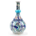 Turkish Iznik pottery vase hand painted with stylised flowers, 37cm high : For further information