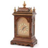 19th century style chinoiserie mantle clock with painted chapter ring having Roman numerals, the