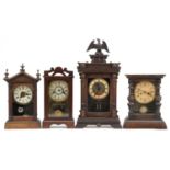 Four mahogany mantle clocks with Roman numerals including one by Junghans and one with eagle finial,