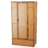 Victorian aesthetic bamboo and hessian style wardrobe with Japanned interior embossed C P