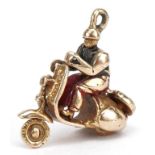 9ct gold and enamel Vespa bike and figure charm with rotating wheel, 1.7cm high, 2.0g : For