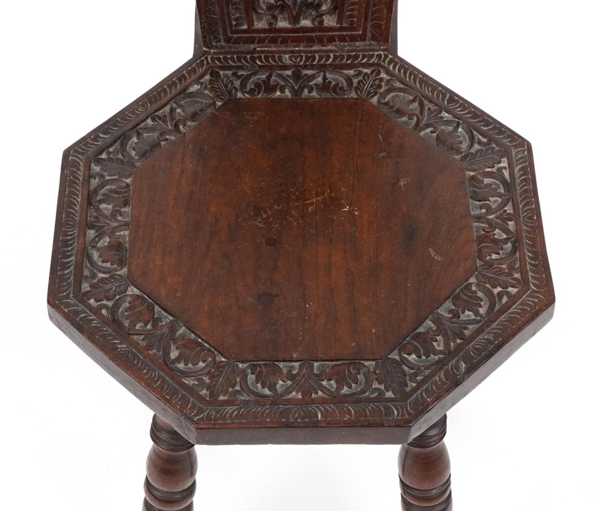 Victorian oak spinning chair deeply carved and pierced with flowers and foliage, 95.5cm high : For - Image 4 of 5