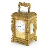 Francois Arsene Margaine, 19th century French miniature brass carriage clock with key, painted