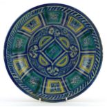 Spanish pottery footed bowl hand painted with stylised motifs, 30cm in diameter : For further