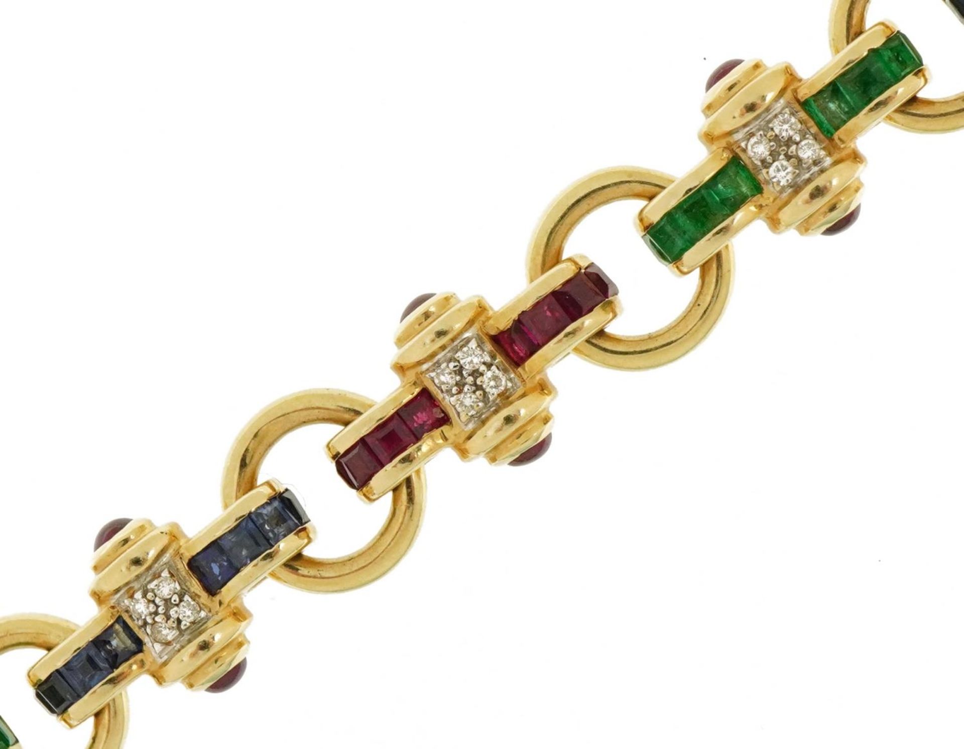 Franklin Mint, 14k gold tri-colour bracelet set with thirty two sapphires, thirty two emeralds,