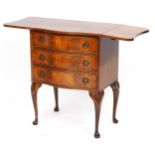 Mahogany drop leaf serpentine three drawer chest raised on cabriole legs, 73cm H x 41cm D x 60cm W