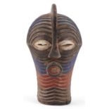 Tribal interest African partially painted carved wood face mask, 38cm high : For further information