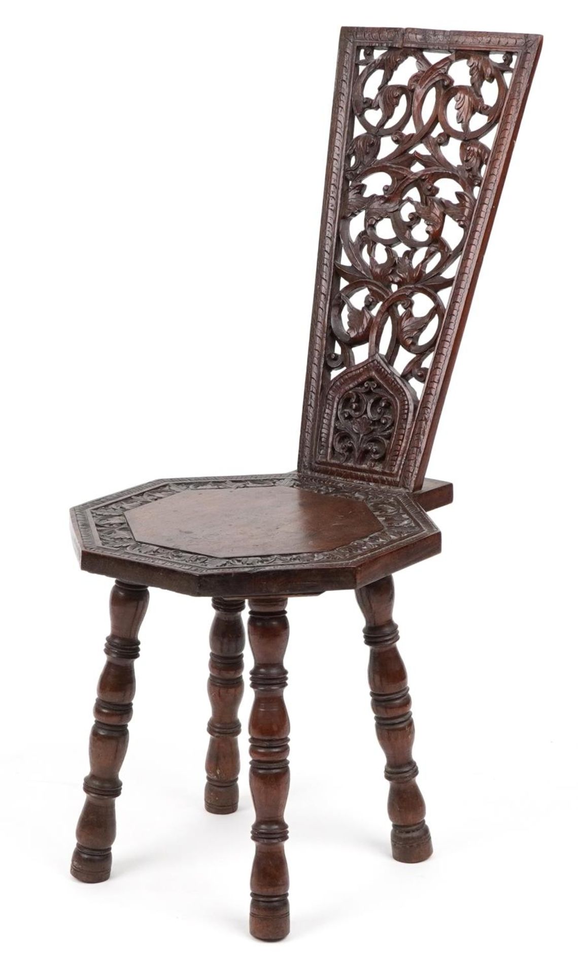 Victorian oak spinning chair deeply carved and pierced with flowers and foliage, 95.5cm high : For