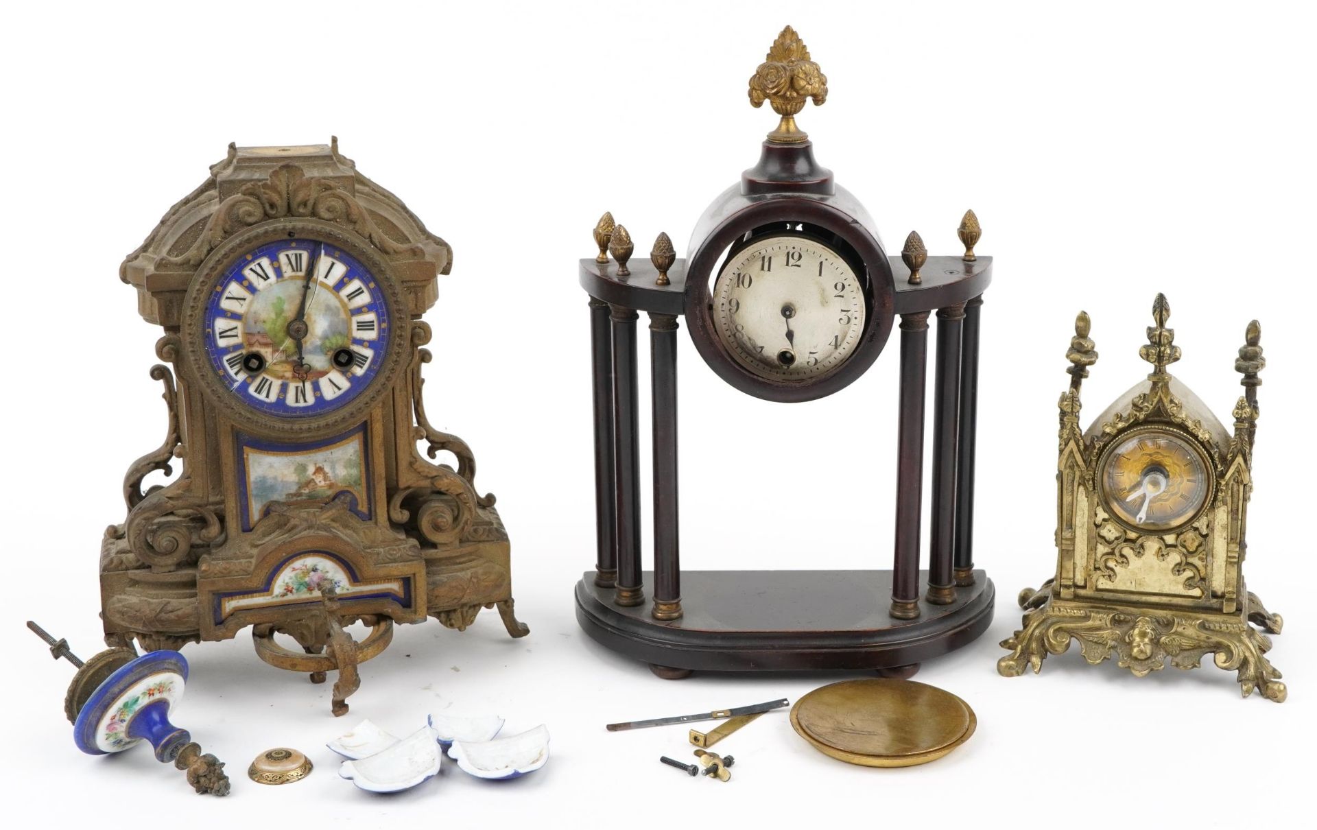 Three 19th century and later clocks including a Gothic style brass cased example and a gilt