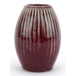 Chinese porcelain fluted vase having a sang de boeuf glaze, 15cm high : For further information on