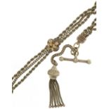 Victorian ladies unmarked silver watch chain with jewellery clasp, T bar and tassel drop, 28cm in