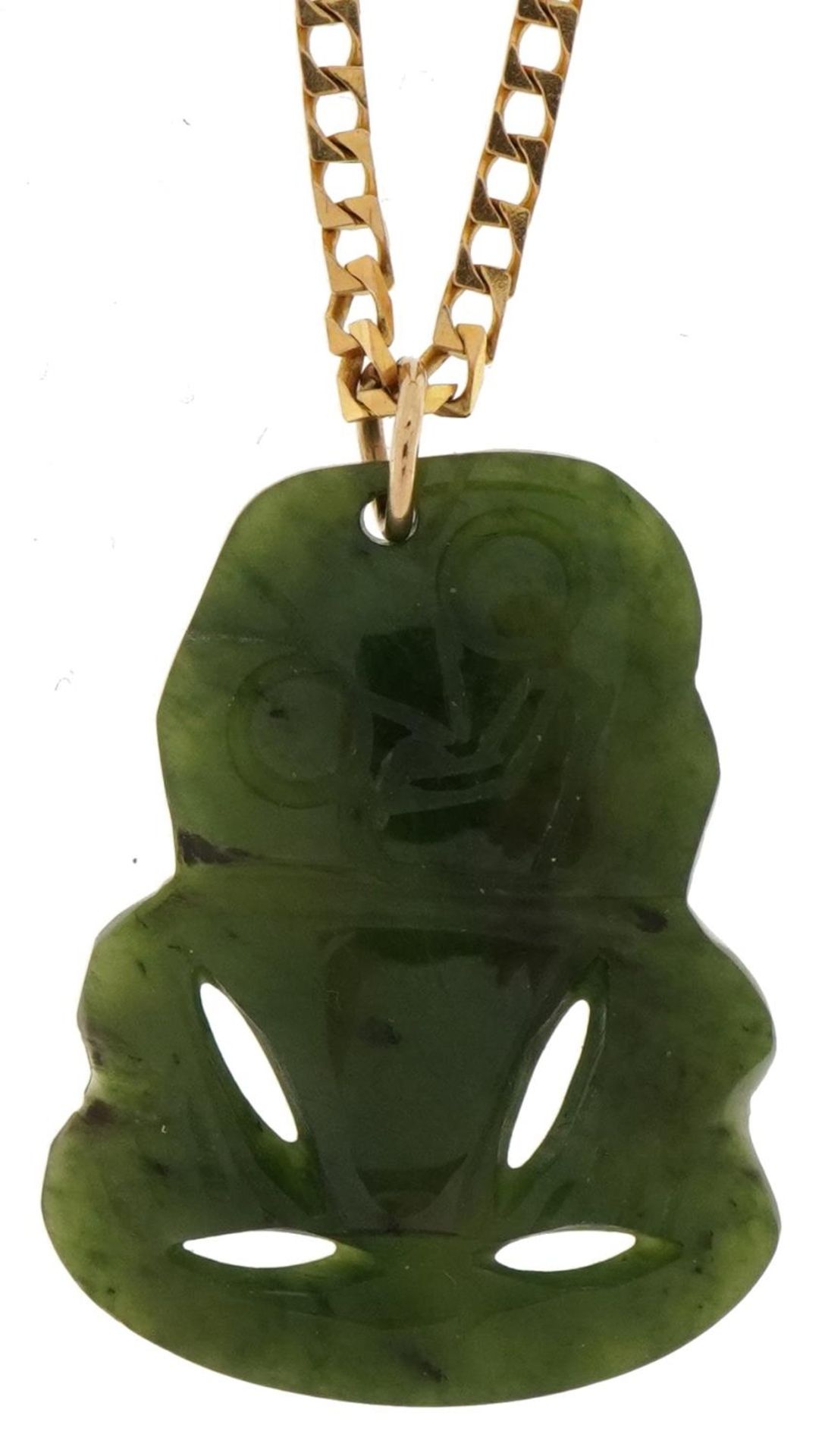 Carved spinach jade tiki pendant on 9ct gold curb link necklace, 3.0cm high and 45.5cm in length,