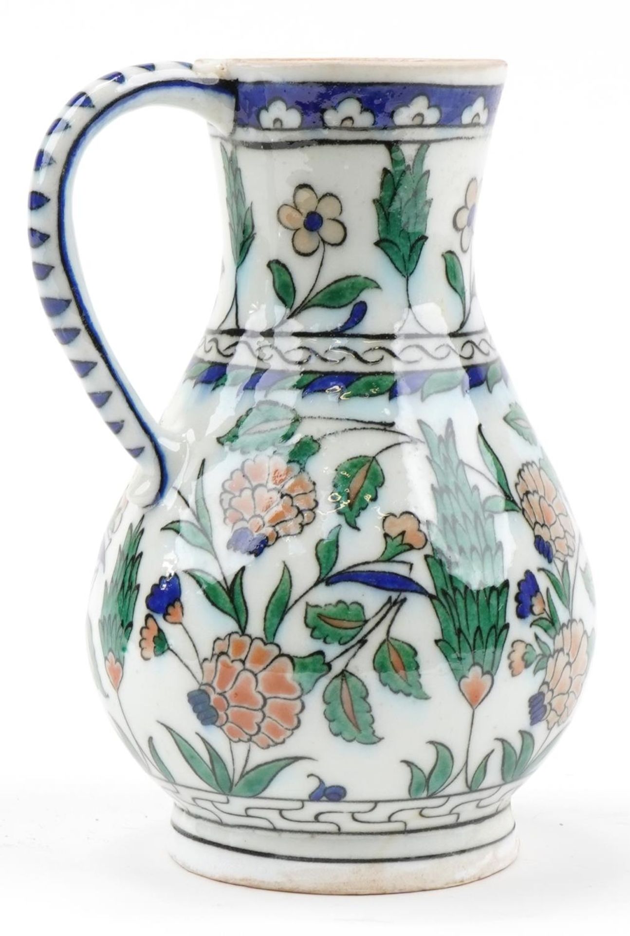Turkish Iznik pottery handled jug hand painted with stylised flowers, 25cm high : For further - Image 2 of 3