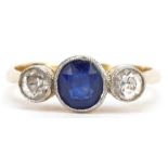 Art Deco 18ct gold sapphire and diamond three stone ring, the sapphire approximately 5.0mm x 4.