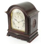 Mahogany bracket clock striking on four rods and a gong with barley twist columns and foliate