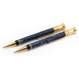 Two Parker Duofold blue marbleised propelling pencils : For further information on this lot please