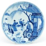 Chinese blue and white porcelain dish hand painted with figures in a landscape, character marks