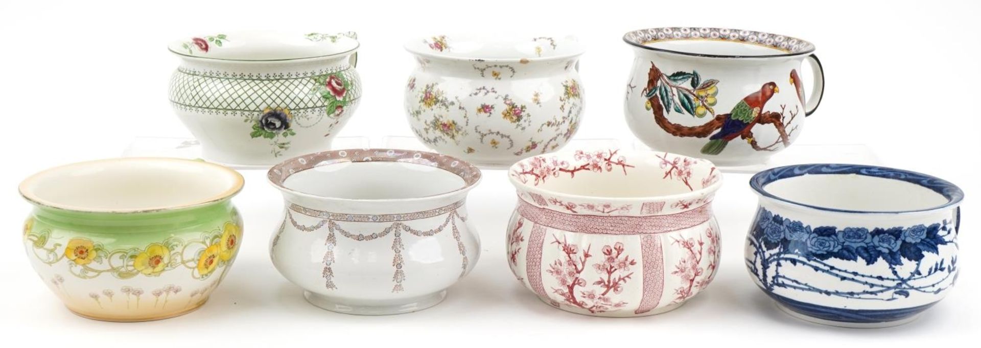 Seven Victorian chamber pots including Ridgeways Cherry, Crescent, Adderleys Keen-Lung, Booths and S