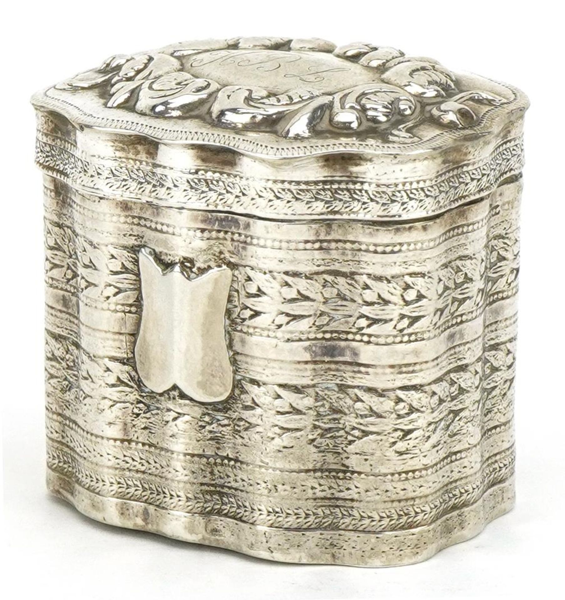 Antique Dutch silver trinket with hinged lid embossed and engraved with flowers, indistinct